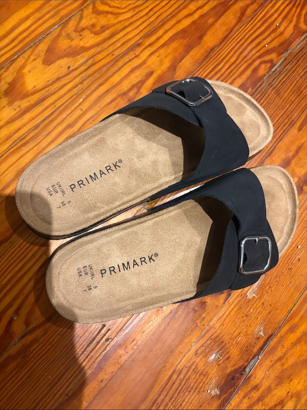 Primark Black Slide Sandals with Tan Footbed and Silver Buckle